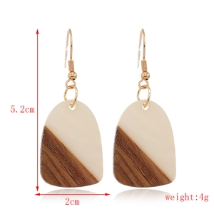 Detail view of retro resin and wood earrings showing dimensions 5.2cm by 2cm and weight 4g