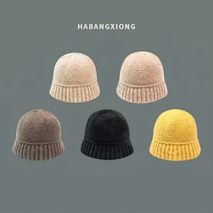 Women's warm knitted bucket hat collection in five stylish colors with thick ribbed texture
