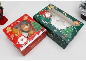 Detailed view of red 4-slot and green 6-slot Christmas cupcake boxes with clear windows