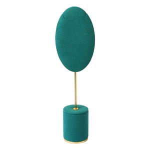 Emerald green velvet necklace display stand with gold metal frame for jewelry storage