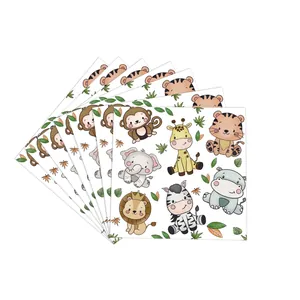 Detail of colorful cartoon zoo animal paper napkins for kids birthday party table setting
