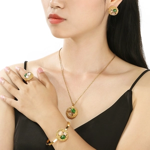 Close-up detail of luxury minimalist stainless steel jewelry set with micro-pave cubic zirconia