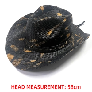 Detail view of a 58cm head measurement on a black woven straw cowboy hat with gold accents