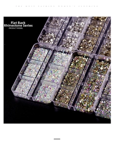 Detailed view of mixed flatback rhinestones in 6-grid organizer for nail art DIY
