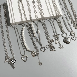 Chic silver-colored layered necklaces with heart and butterfly pendants and OT clasps