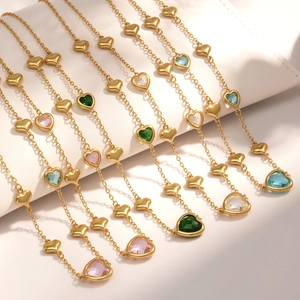 Fashionable stainless steel heart necklace with faceted glass stones in multiple colors