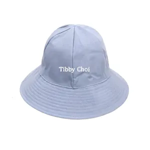 Custom embroidered light blue cotton sun hat for children with personalized Tibby Choi text