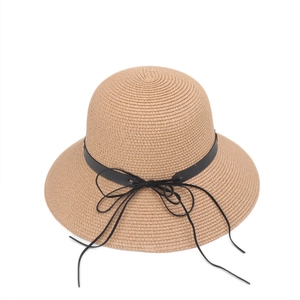 Women's wide brim khaki straw sun hat with black ribbon bow for beach vacations