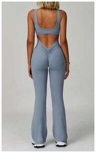 Detail of backless yoga jumpsuit with scrunch butt lifting effect and flared leg