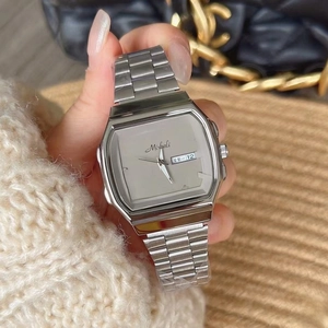 Minimalist Mishali women watch with silver stainless steel band and purple dial display