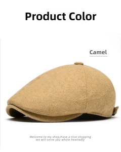 Detailed side view of a camel wool flat cap showing the premium twill fabric texture
