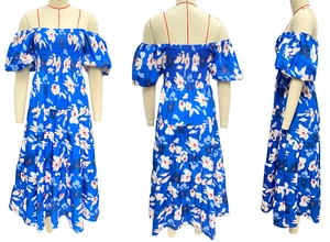 Detail of blue floral off-shoulder maxi dress with ruched bust and tiered skirt