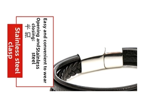 Detail of stainless steel clasp on black woven leather bracelet showing easy closure