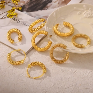 Chic gold-plated U-shaped earrings set with textured weave and polished geometric designs