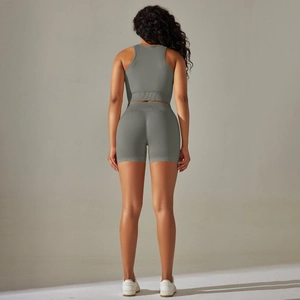 Detail view of the seamless knit sage green yoga set with supportive ribbed high waistband