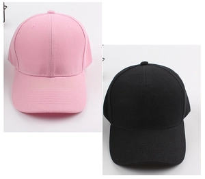 Detail view of pink and black cotton baseball caps showing twill fabric and 6-panel design