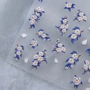3D embossed nail art stickers with elegant white camellia and blue leaf designs