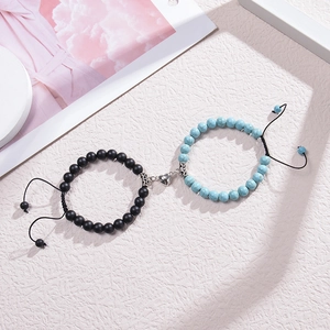 Magnetic heart couple bracelets with turquoise and matte black beads on white base