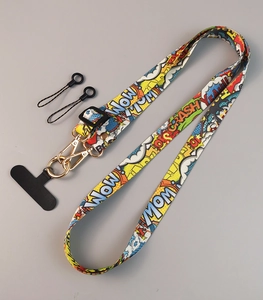 Detailed view of adjustable crossbody phone strap with colorful cartoon comic pattern