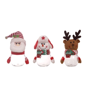 Three Christmas candy jars with Santa, Snowman and Reindeer plush lids on clear bottles