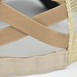 Detail of cross elastic bands and breathable mesh on a khaki ponytail baseball cap