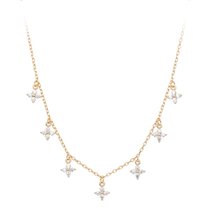 Close-up of a gold s925 sterling silver necklace featuring seven zircon flower pendants