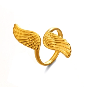 Minimalist golden wing open ring with detailed feather texture in polished stainless steel