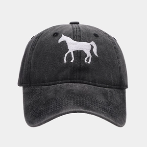 Close-up of horse embroidery on washed dark grey cotton twill baseball cap