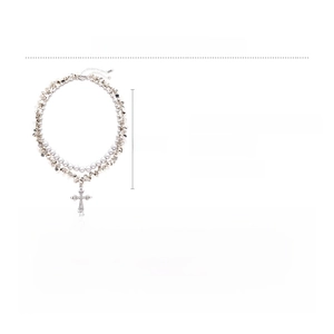Detail view of double-layer pearl necklace with rhinestone cross and metal sequins