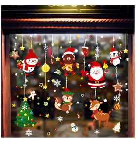 Detailed Christmas window decals featuring Santa, snowman, and reindeer on glass surface