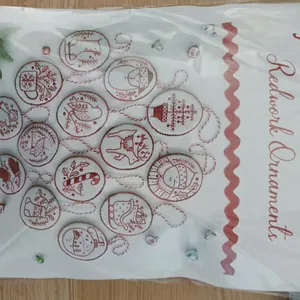 Handmade redwork embroidery Christmas ornaments set with reindeer and snowman motifs