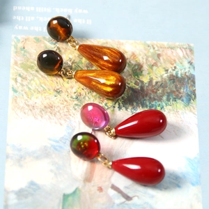 Colorful vintage resin teardrop earrings with a glossy amber and red polished finish