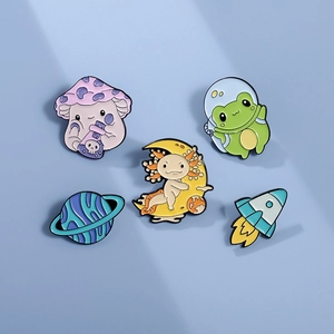 5-piece space and animal enamel pin set including frog astronaut and rocket badges