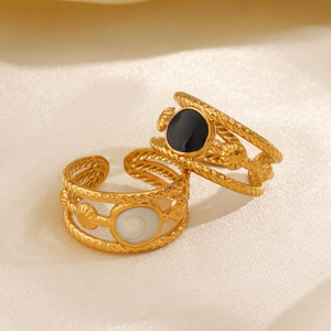 18K gold plated stainless steel enamel rings with twisted rope design on white silk