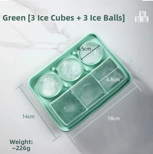 Detail view of mint green silicone ice mold showing 18x14cm dimensions for 3 spheres and 3 cubes