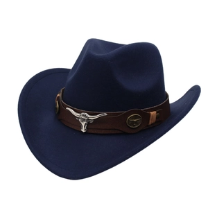 Detail of navy felt cowboy hat featuring brown leather band and silver bull head ornament