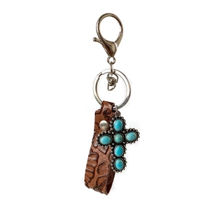 Vintage embossed leather keychain with turquoise pendant and pumpkin flower details