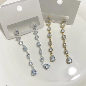 Elegant gold and silver long tassel teardrop earrings with sparkling crystal rhinestones
