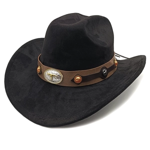 Detailed view of black suede cowboy hat with steer skull emblem on leather band