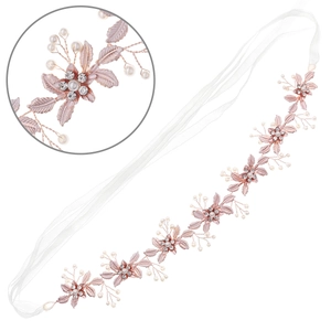 Detail of rose gold floral bridal headband with pearls, crystals and white ribbon ties