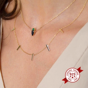 Layered 925 sterling silver necklace with gold finish featuring colorful drop pendants
