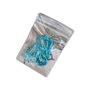 Sparkly blue glitter waterdrop BB hair clips for girls set in clear packaging
