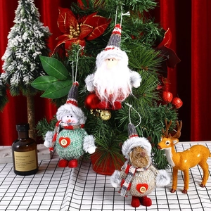 Three-piece knitted Christmas ornaments set featuring Santa Snowman and Reindeer figurines