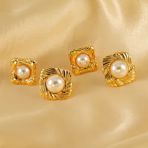 Vintage 18K gold-plated baroque pearl stud earrings set with elegant hammered texture