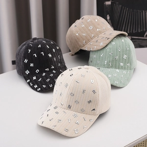 Corduroy baseball caps with metal letters available in black, green, khaki, and beige