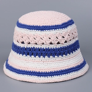 Close-up of handmade crochet bucket hat featuring hollow floral patterns and stripes
