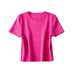 Detail of rose pink short sleeve knit top showing ribbed neckline and sleeve cuffs