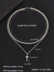 Detailed view of silver stainless steel double layer chain necklace with cross pendant