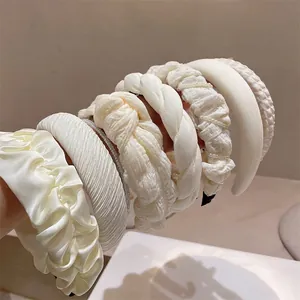 Creamy white pearl and pleated fabric headbands collection for stylish hair styling