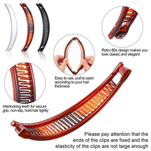 Detail of banana hair clips in white, amber, and black with interlocking non-slip teeth